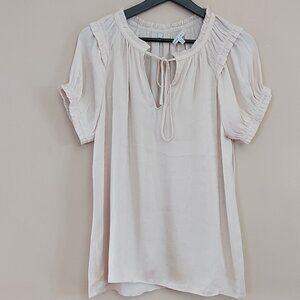 Naked Zebra blouse with tie front closure ruffle detail on the sleeve and collar